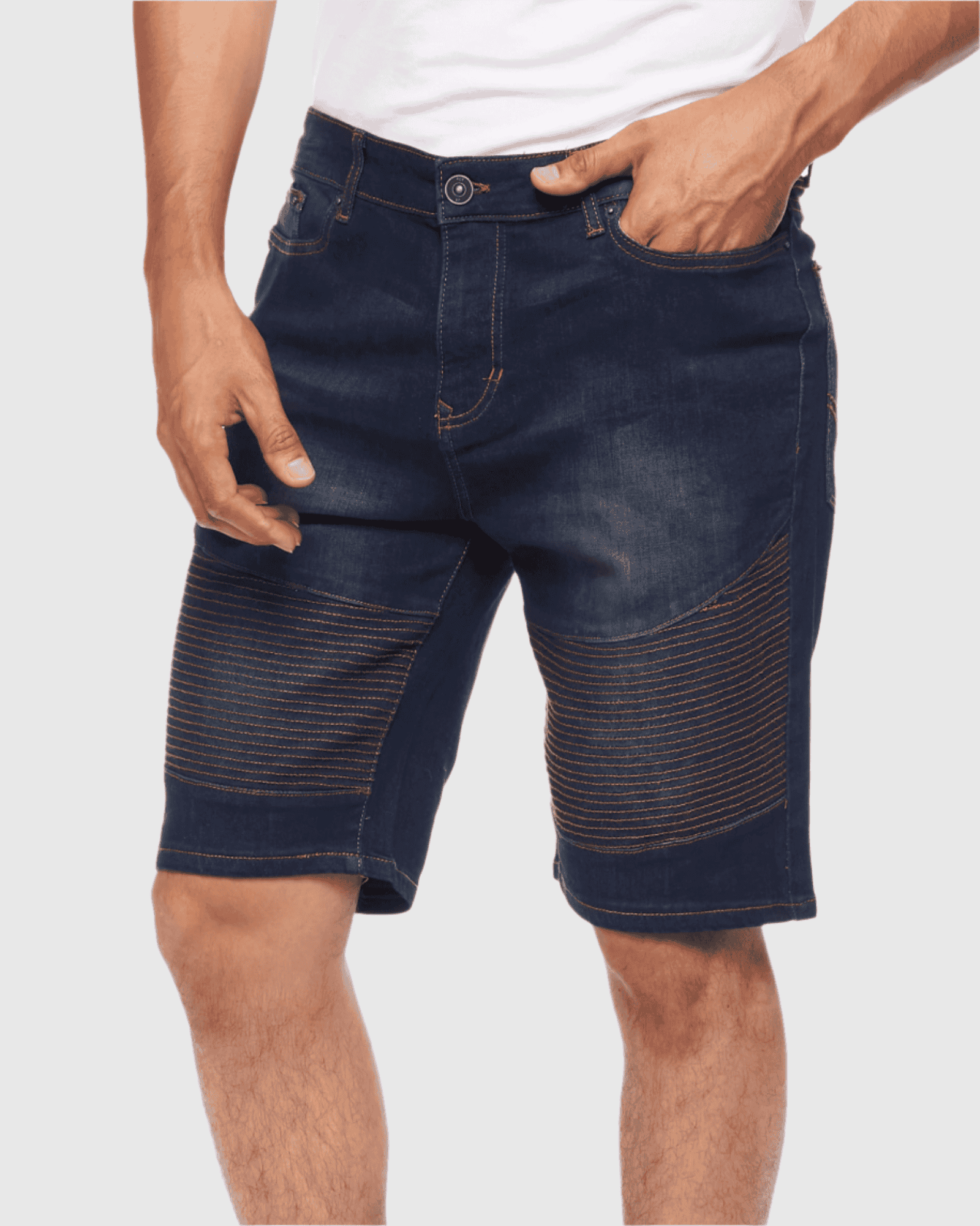 Model showcasing the relaxed loose-straight fit of the Men’s Brad Moto Denim Shorts from Ring of Fire Clothing, highlighting the zipper fly with button closure and two hand pockets at the front