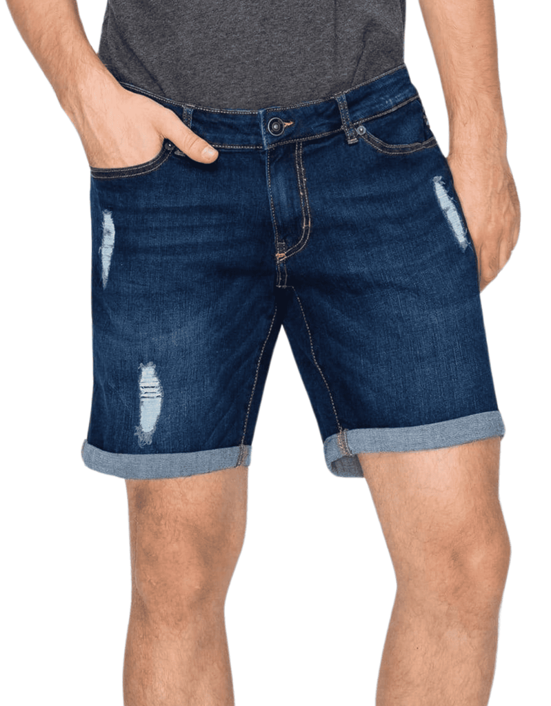 Model showcasing the Men’s Jake Rip N Repair Denim Shorts in Twilight color, front angle view