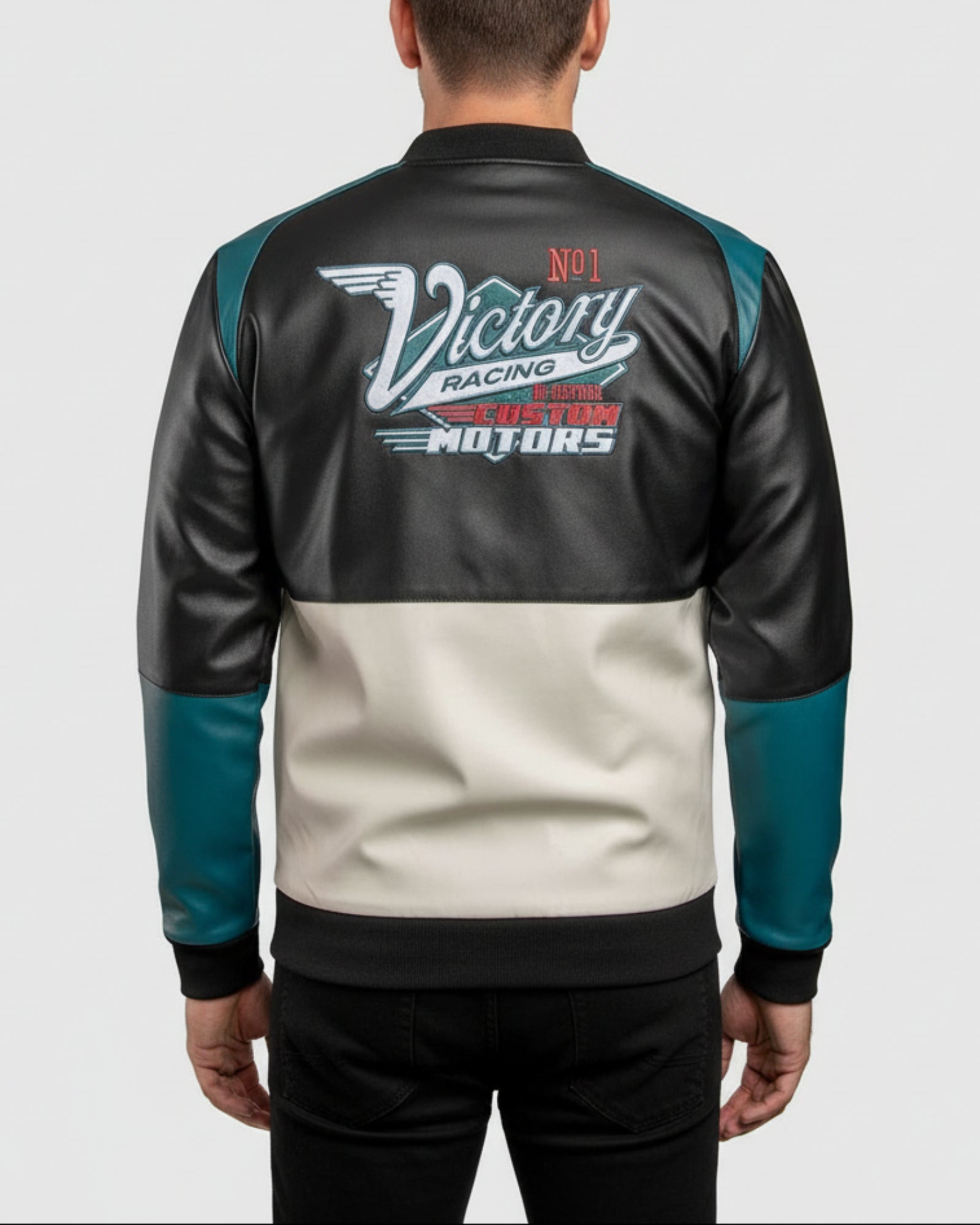 Black, white, and teal racing jacket with 'Victory Racing' logo on a light gray background