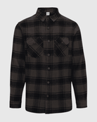 Black plaid shirt on a light gray background