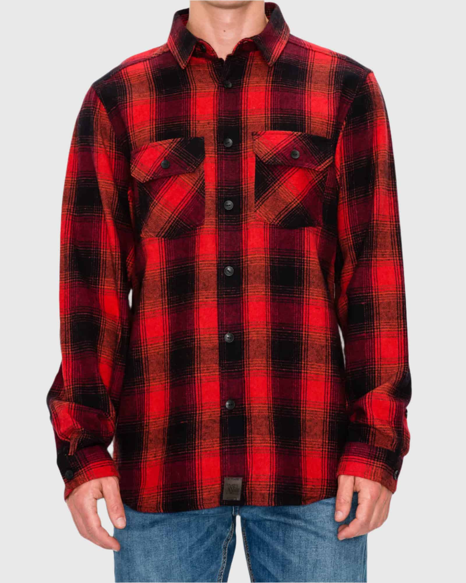 Red and black plaid shirt worn by a person on a gray background