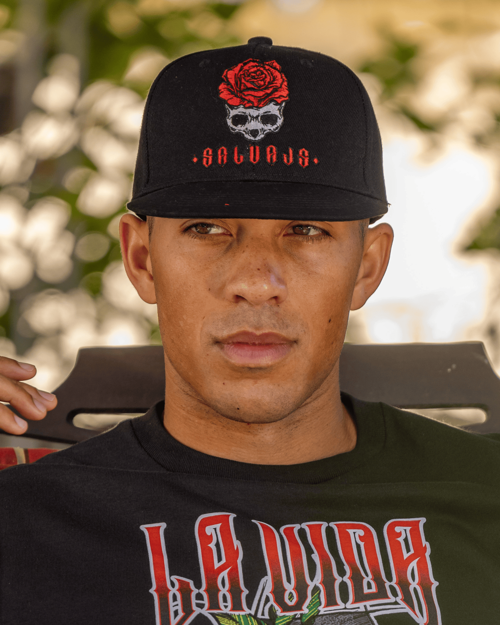 Close-up of a model sporting a stylish snapback cap from our collection