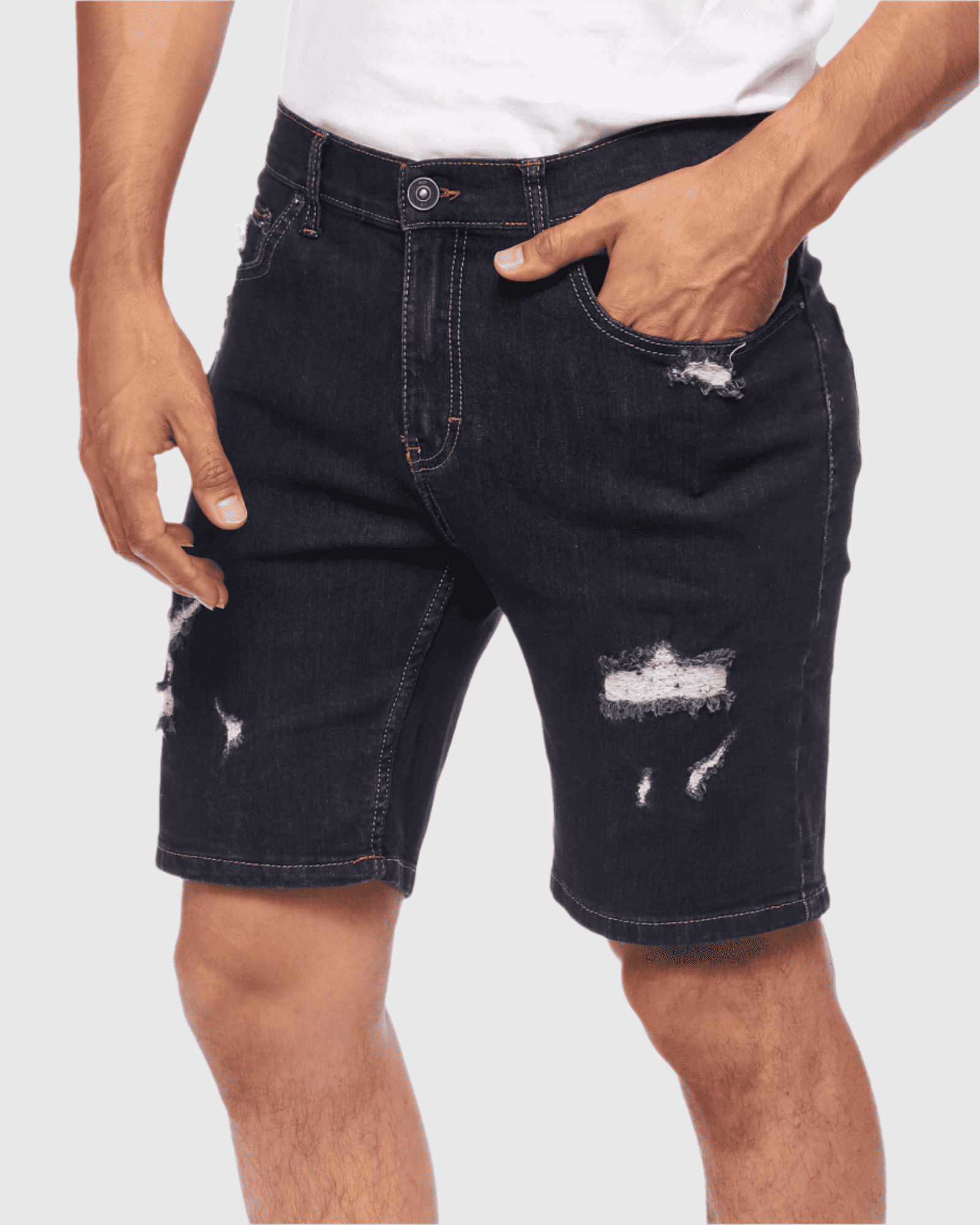 Angle view of model wearing Rinse color Men’s Ripper Denim Shorts by Ring of Fire