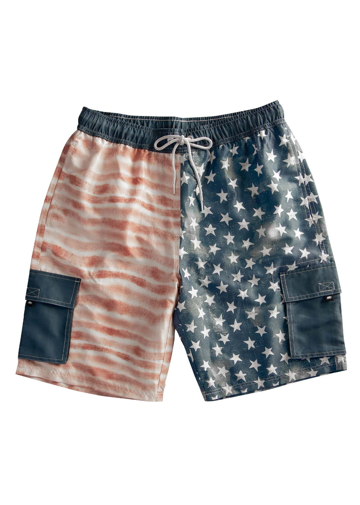 Flat lay of the front side of Ring of Fire’s Men’s Americana Board Shorts showing the American flag design