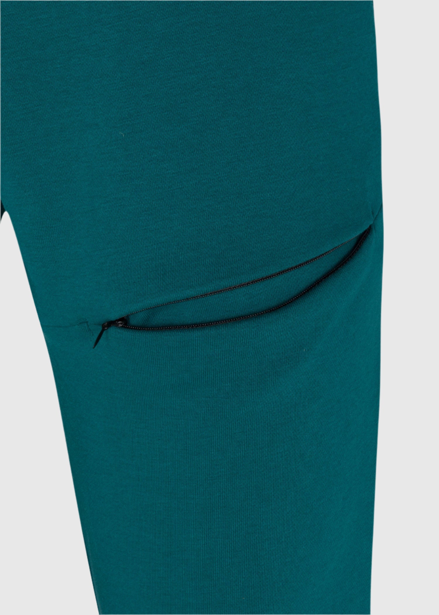 Mens drawstring premium September jogger in deep teal thigh seam zipper pocket