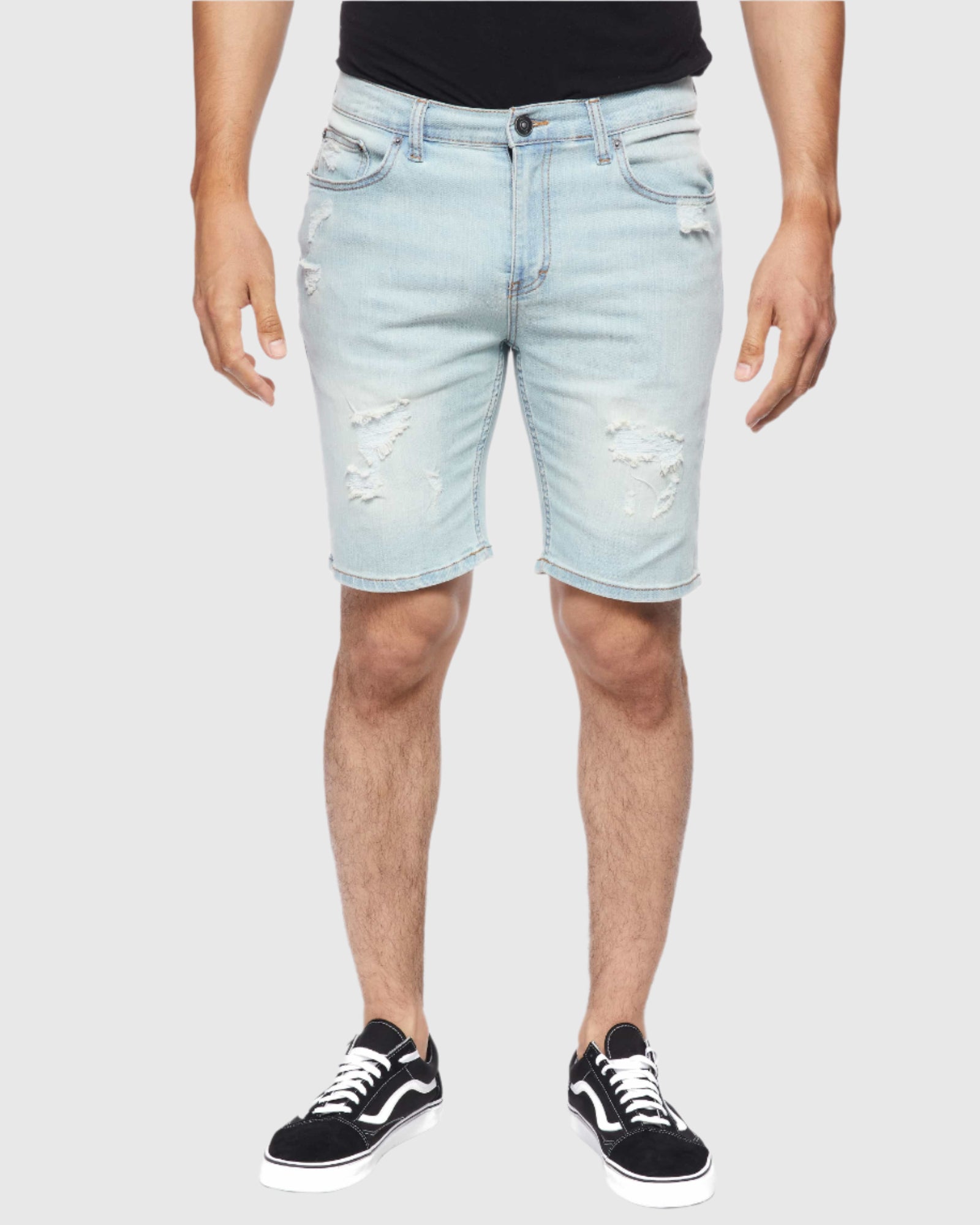 Second Front view of model wearing Ring of Fire’s Men’s Ripper Denim Shorts in Blue Bleached
