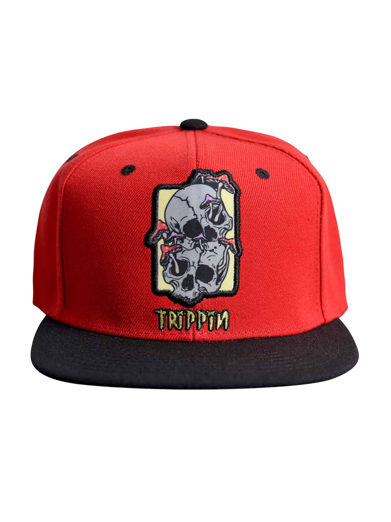 Front view of the ‘Men’s Trippin Snapback’ by Ring of Fire Clothing in Red Black Grey color, showcasing the unique dual skull design with mushrooms sprouting from the eye sockets, one size fits all.