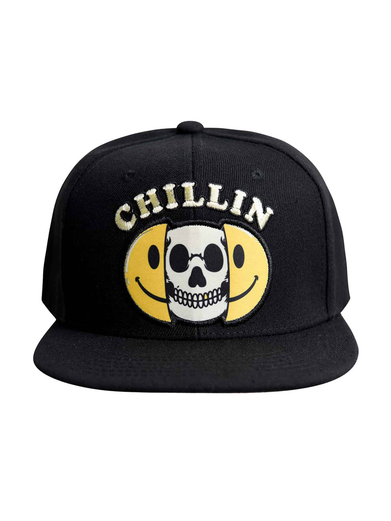 Front view of the ‘Men’s Chillin Snapback’ by Ring of Fire Clothing in Black, White, and Yellow color, showcasing the unique split happy face and skull design with ‘chillin’ text.