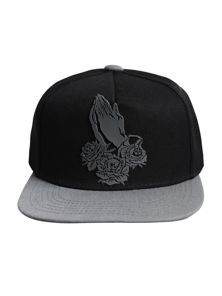 Front view of the ‘Men’s Prayer Skull Roses Snapback’ by Ring of Fire Clothing in Black Grey color, showcasing the unique design of prayer hands with roses and skulls inside the roses, in one size.