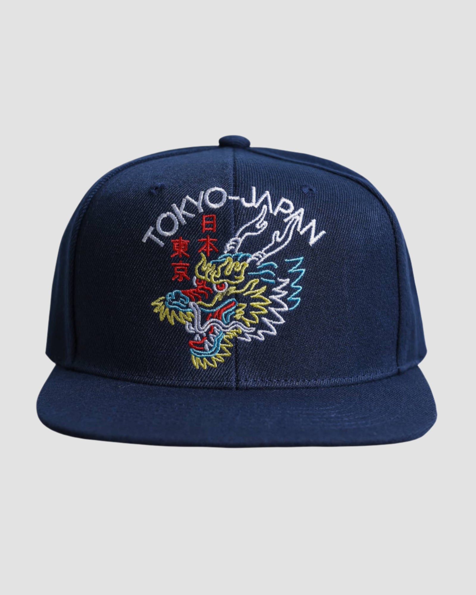 Front view of the ‘Men’s Tokyo Dragon Snapback’ in Navy Yellow White Red color, showcasing the intricate dragon design and Japanese characters with ‘Tokyo-Japan’ text, by Ring of Fire Clothing.