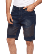 Model showcasing the relaxed loose-straight fit of the Men’s Brad Moto Denim Shorts from Ring of Fire Clothing, highlighting the zipper fly with button closure and two hand pockets at the front