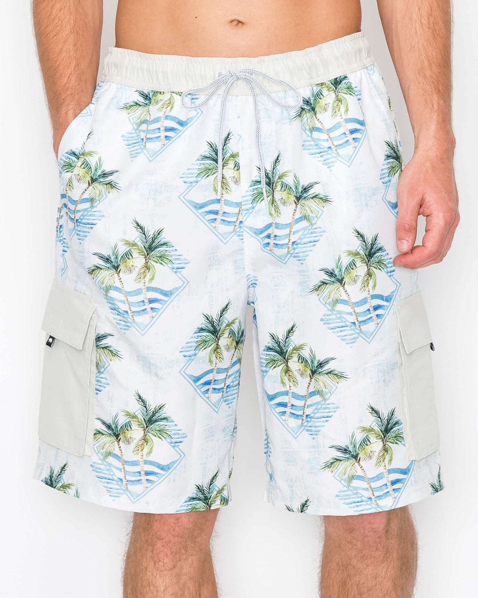 Close-up of men’s palm geo cargo boardshorts showcasing the hand-drawn oasis design on a light background and Velcro cargo pocket.