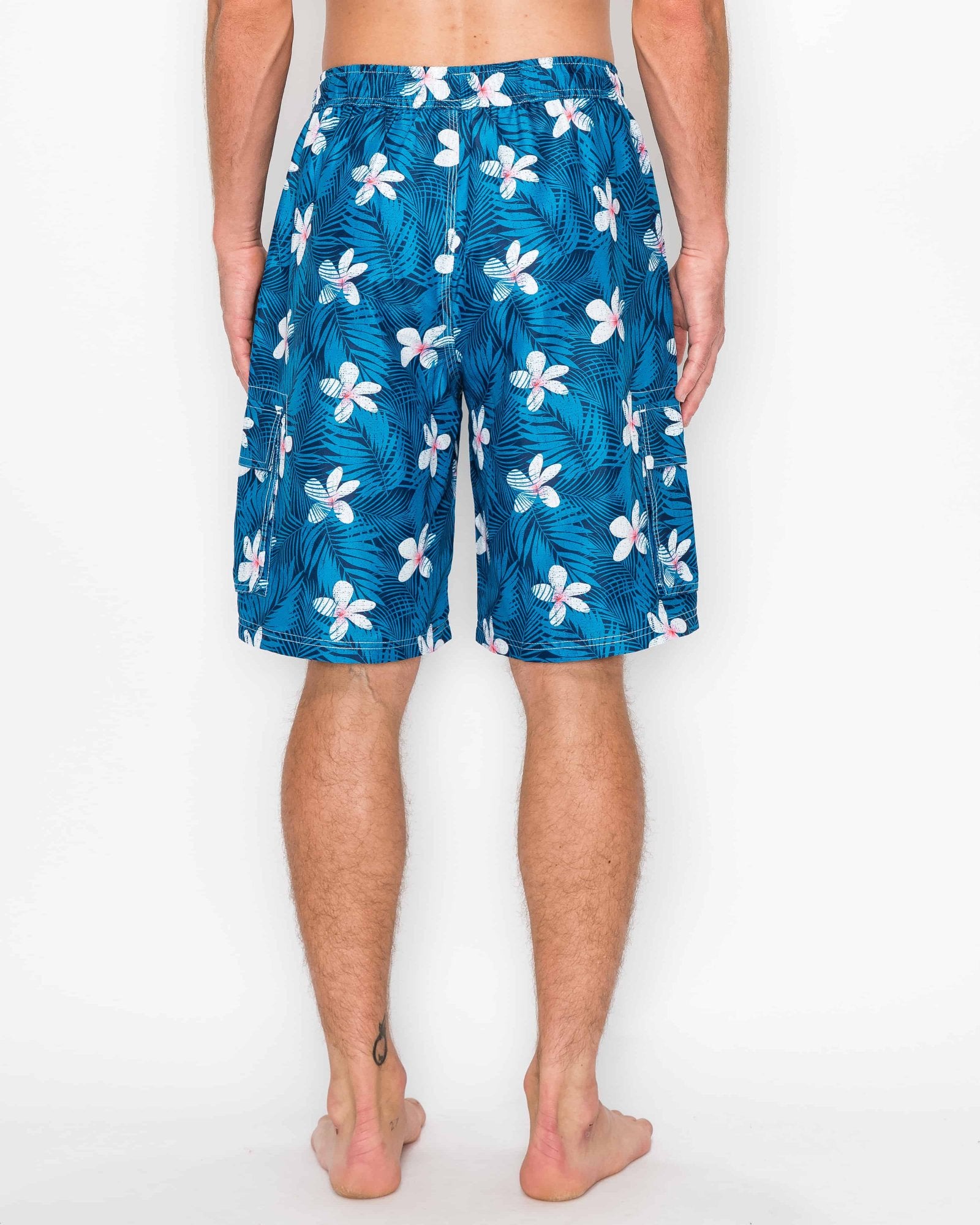 Back view of Men’s Midnight Bloom Cargo Boardshorts featuring the all-over tropical flower print and faux fly zipper.