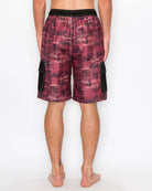 Back view of men’s Aztec Heat Cargo Boardshorts featuring below-the-knee length and faux fly zipper.