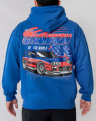 Blue hoodie with a car graphic and 'Champion of the World' text on the back, worn by a person.