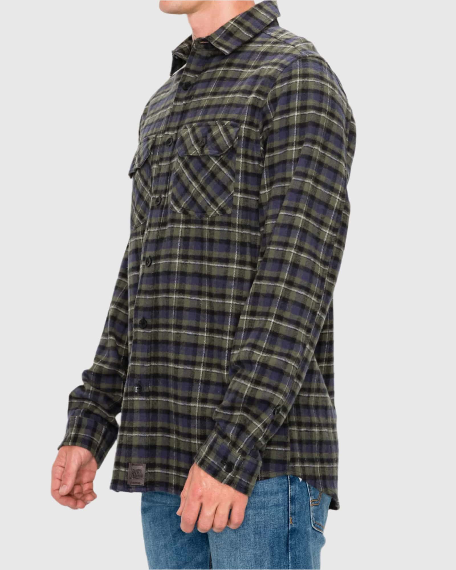 Plaid shirt worn by a person on a plain background
