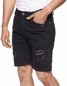 Model wearing Ring of Fire’s Men’s Ripper Denim Shorts in Black Paradise - Angle View