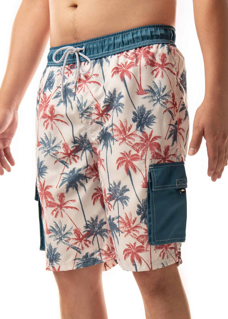 Angled shot of the model wearing the Men’s Palm Splash Board Shorts, showcasing the overall design and functionality