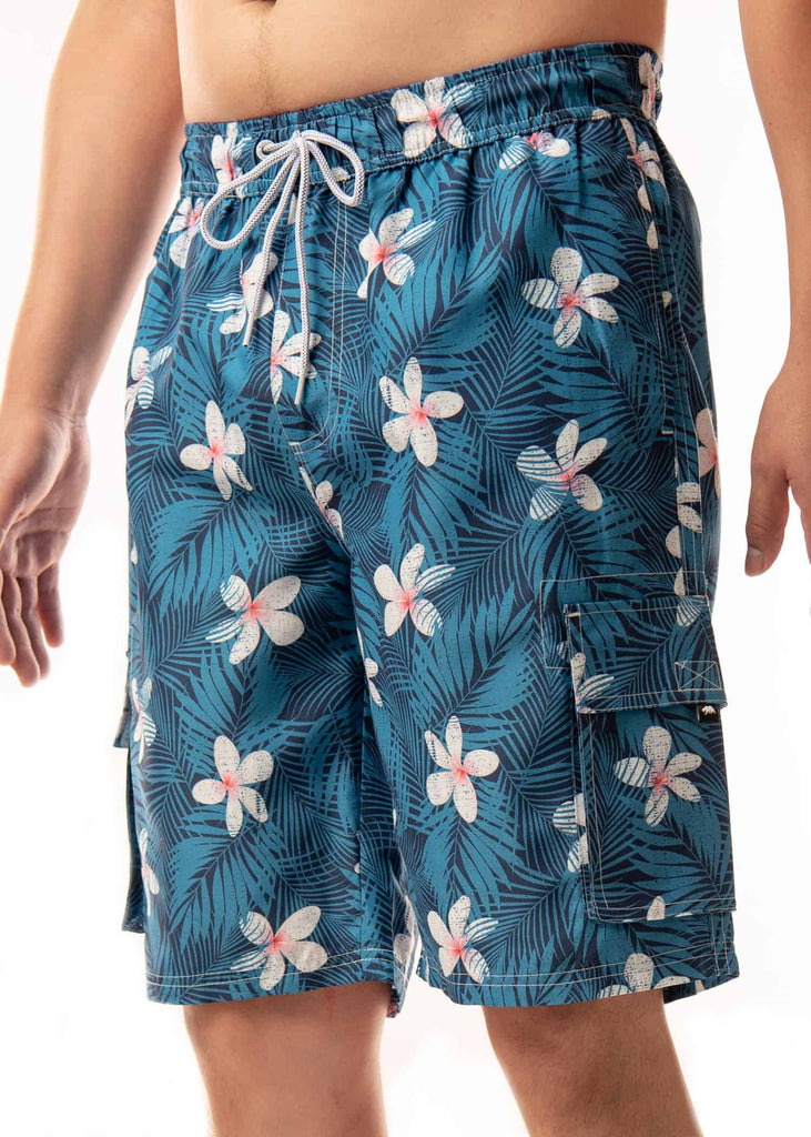 Angled view of model in Men’s Midnight Bloom Board Shorts, capturing the overall elegance of the design