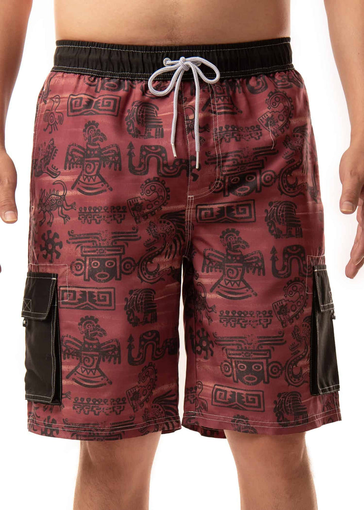 Model wearing Men’s Aztec Heat Board Shorts, front view, displaying the regular fit and below-the-knee length