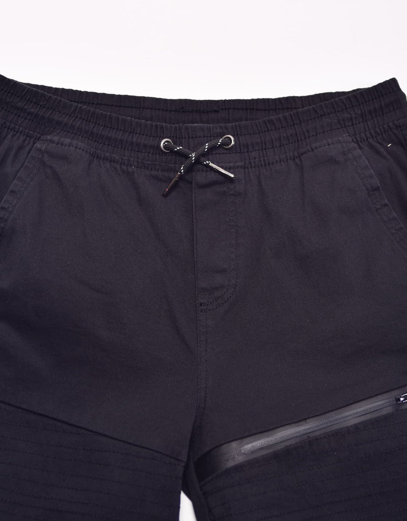 Boy's leftout twill moto shorts in black elastic waistband with drawstring closure