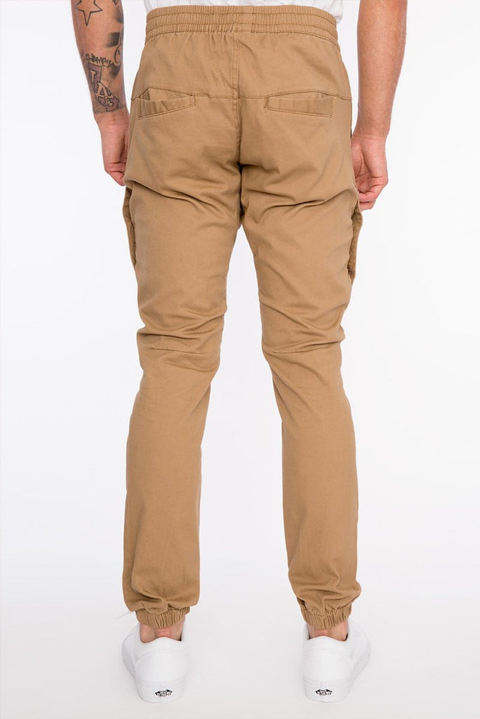 Mens drawstring major heat seal stretch joggers in Dull Gold back pockets 