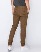 Mens drawstring leftout moto joggers in Light Brown back pockets 