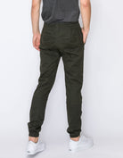 Mens drawstring leftout moto joggers in Olive back pockets 