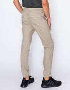 Mens drawstring leftout moto joggers in Tan back pockets 