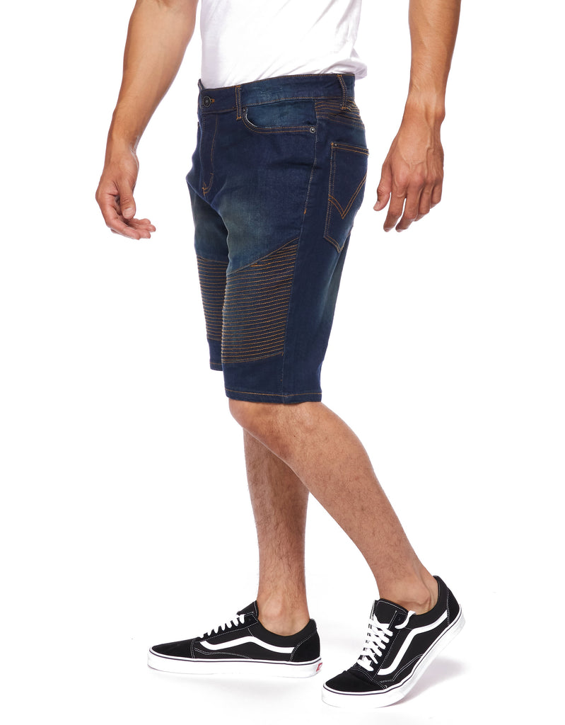 Side view of a model wearing the Men’s Brad Moto Denim Shorts, emphasizing the belt loops and comfortable fit of the shorts