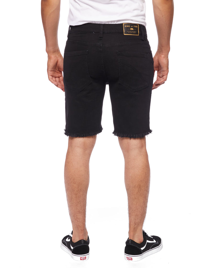 Back view of the Black Paradise Men’s Raw Edge Ripper Denim Shorts on a model, showing the back pockets and overall fit