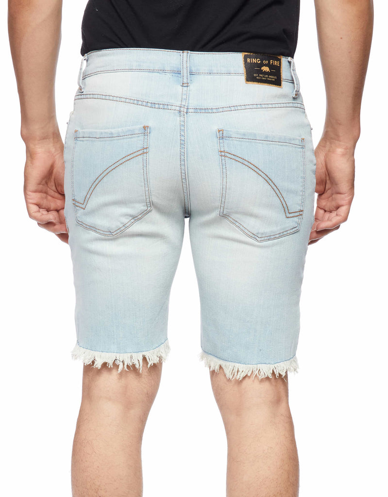 Back view of the Blue Bleached Men’s Raw Edge Ripper Denim Shorts on a model, showing the back pockets and overall fit