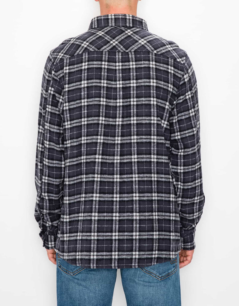 Model wearing Charcoal Black Men’s Andrew Plaid Flannel Shirt, back view